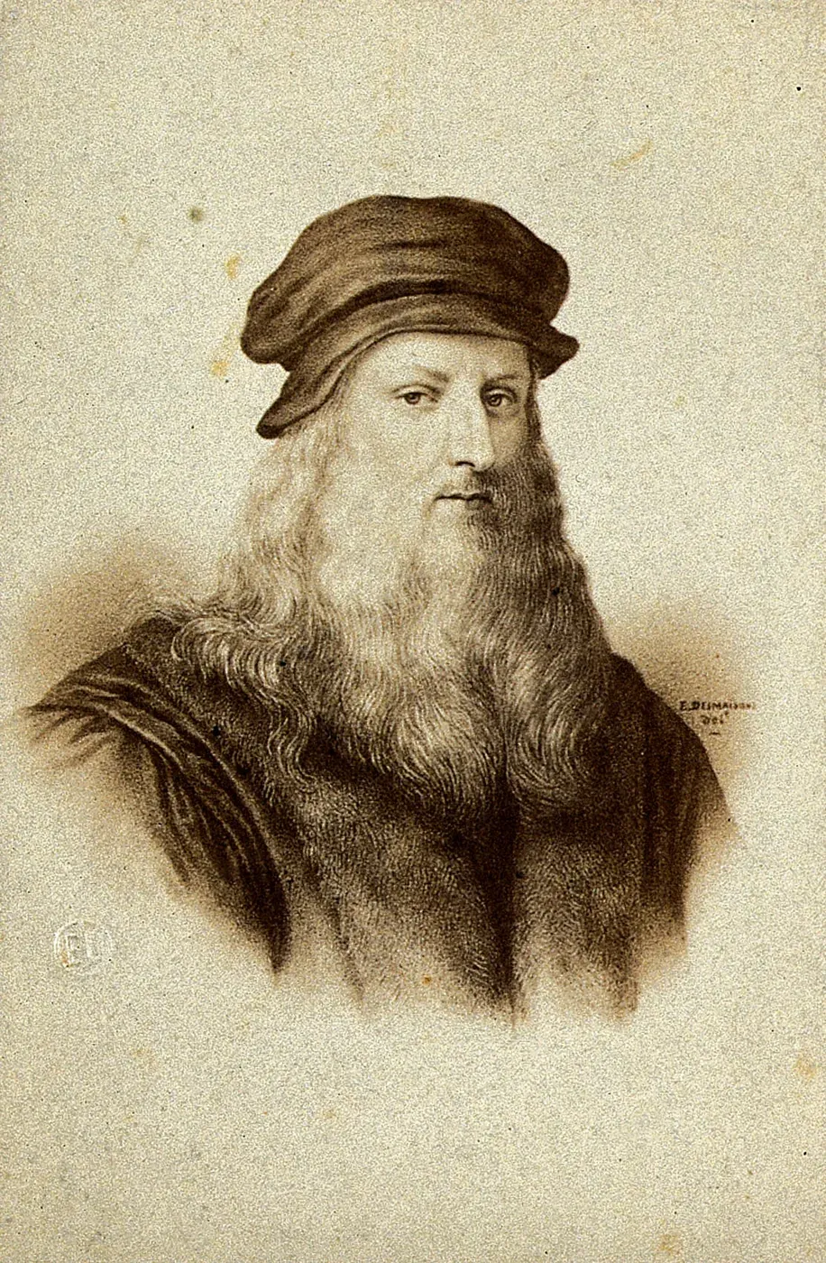 An engraved bust portrait of Leonardo da Vinci in a cap, with a long beard, after a print by E. Desmaisons.